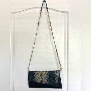 Asymmetrical Black Snakeskin Clutch